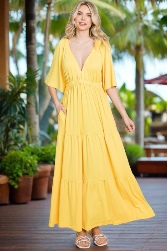 Yellow Backless Plunge Resort Maxi Dress – the epitome of sun-soaked sophistication! Radiate beachside glamour with its vibrant yellow hue and daring plunge neckline, perfectly complemented by the alluring backless design. Crafted for resort-worthy allure, its flowing maxi silhouette ensures graceful movement with every step. Whether lounging poolside or sipping cocktails at sunset, this dress is your go-to for unforgettable moments