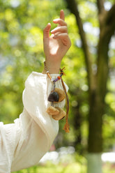 "The Tribal Rhythm" - Handmade -Woven Macrame Bracelet with Singing Seed Pods
